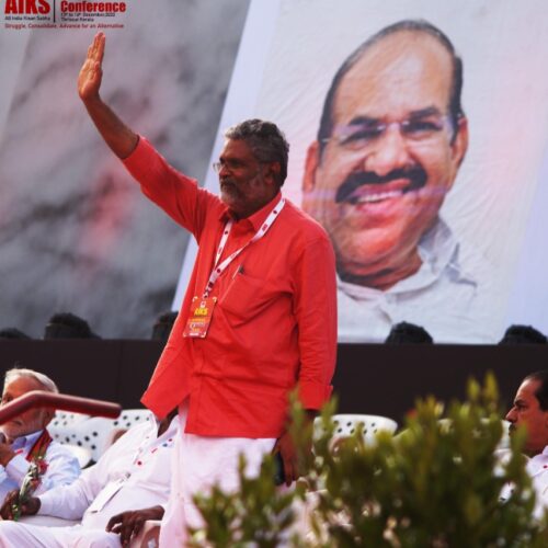 Comrade P Krishnaprasad greets the people at the concluding public meeting. December 16, 2022.