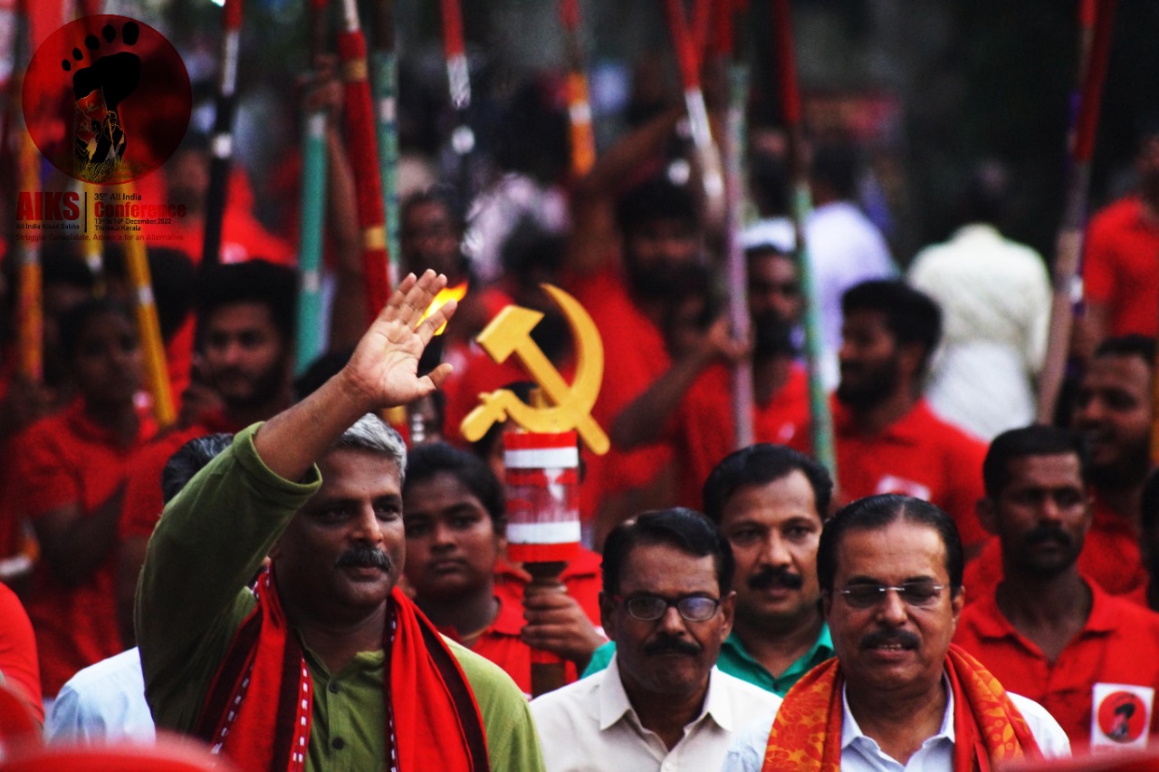 Comrade Vijoo Krishnan, Valsan Panoli and M Vijaykumar lead the Martyrs Flame Jatha into Thrissur city. December 12, 2022.